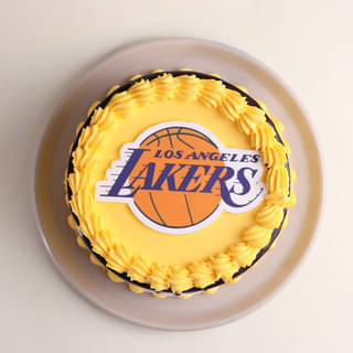 Los Angeles Lakers Theme Cake with Yellow Frosting and Team Logos