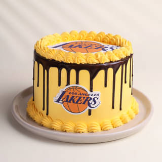 Yellow basketball Cake with Lakers Logos and Chocolate Drip Design