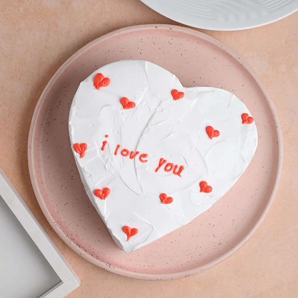 Top View of Little Hearts Vanilla Cake For Valentines Day