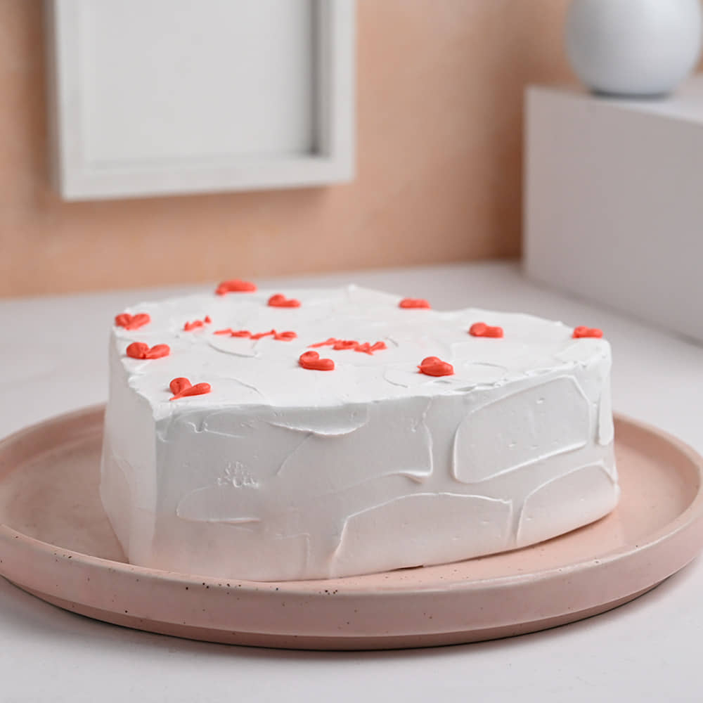 Side View of Little Hearts Vanilla Cake For Valentines Day