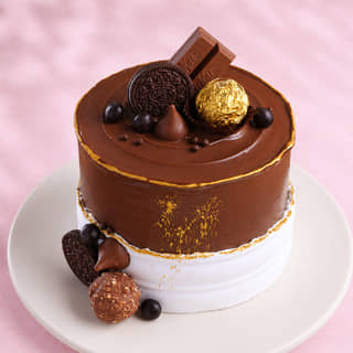 Premium Milk Choco Indulgent Cake with assorted chocolates Premium Milk Choco Indulgent Cake with assorted chocolates