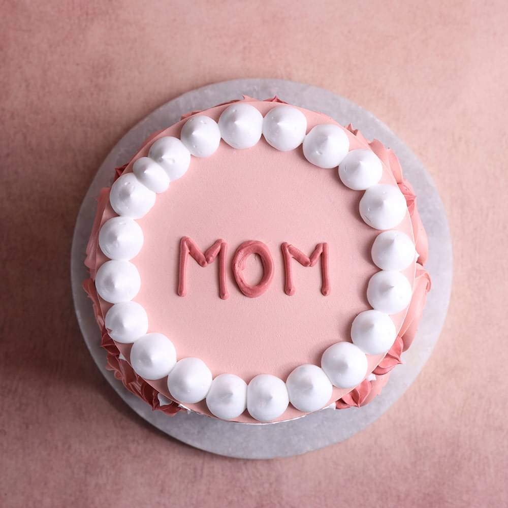 Top View Of Pink Floral Moms Loved Cake