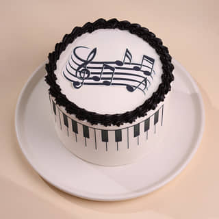 Front View of Musical Notes Piano Cake Front View of Musical Notes Piano Cake