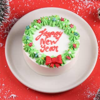 Angled View of New Year Wreath Bento Cake Angled View of New Year Wreath Bento Cake