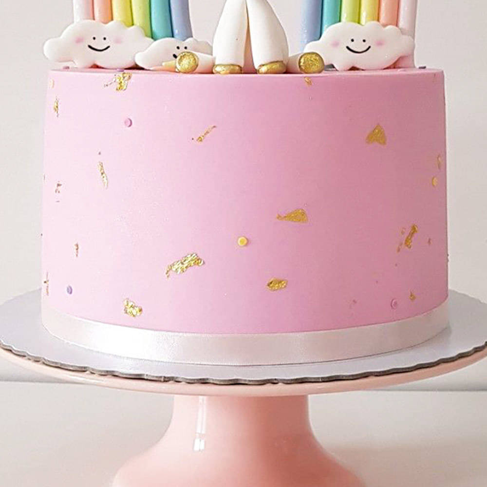 Side View of Pastel Rainbow Unicorn Semi Fondant Cake