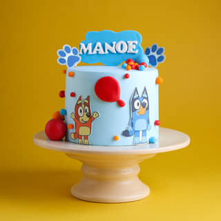 Side View of Paws Fun Bluey Themed Cake Side View of Paws Fun Bluey Themed Cake