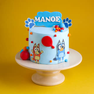 Front View of Paws Fun Bluey Themed Cake Front View of Paws Fun Bluey Themed Cake