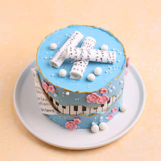 Front View of Pearls N Notes Piano Cake Front View of Pearls N Notes Piano Cake