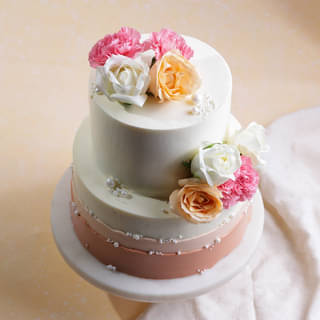 Front View of Petals N Pearls Ombre Cake