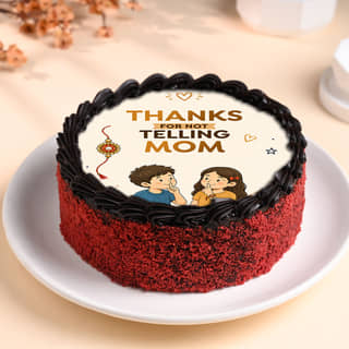 Front View of Photo Cake With A Designer Rakhi Front View of Photo Cake With A Designer Rakhi