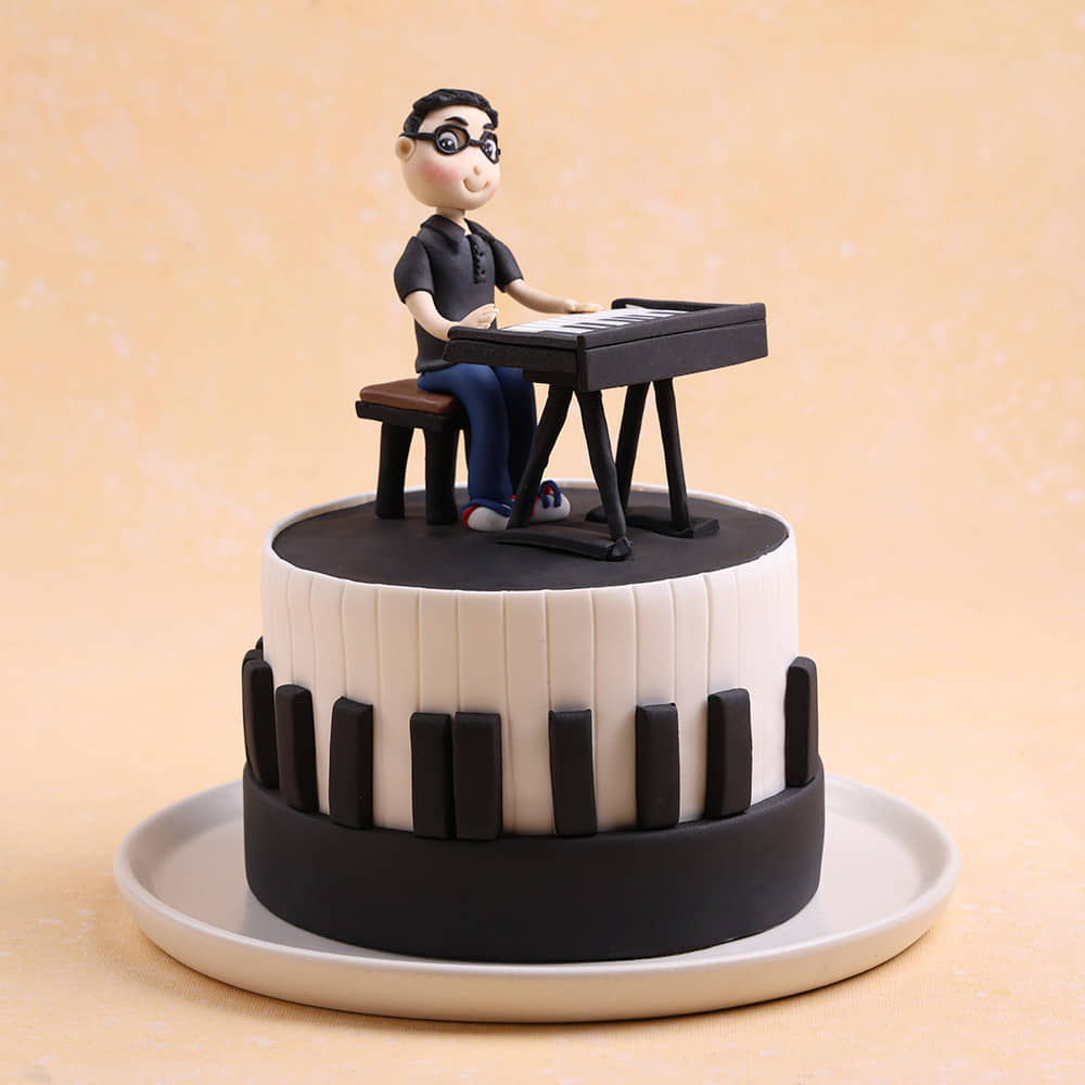 Piano Player Cake