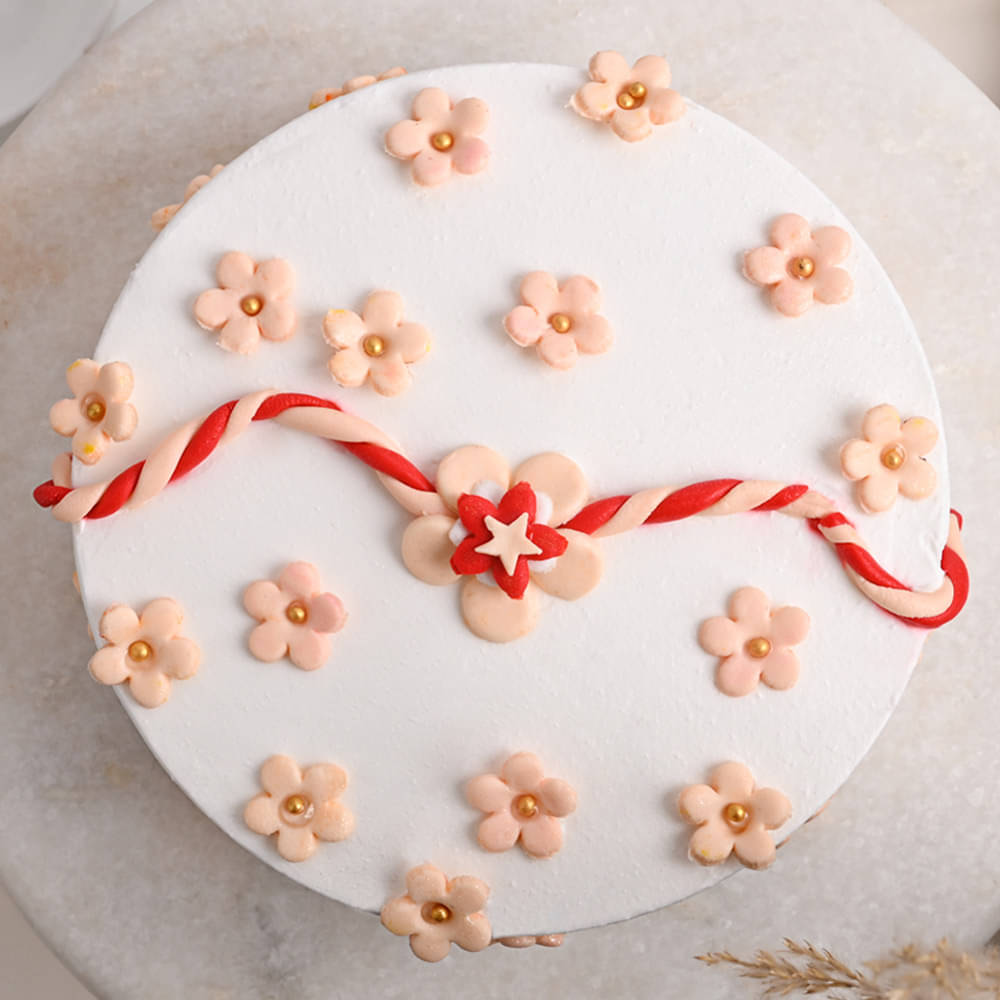 Top View of Pineapple Cake With Rakhi