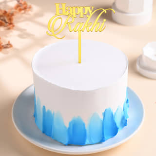 Front View of Pineapple Cake N Bhaiya Bhabhi Rakhi Set