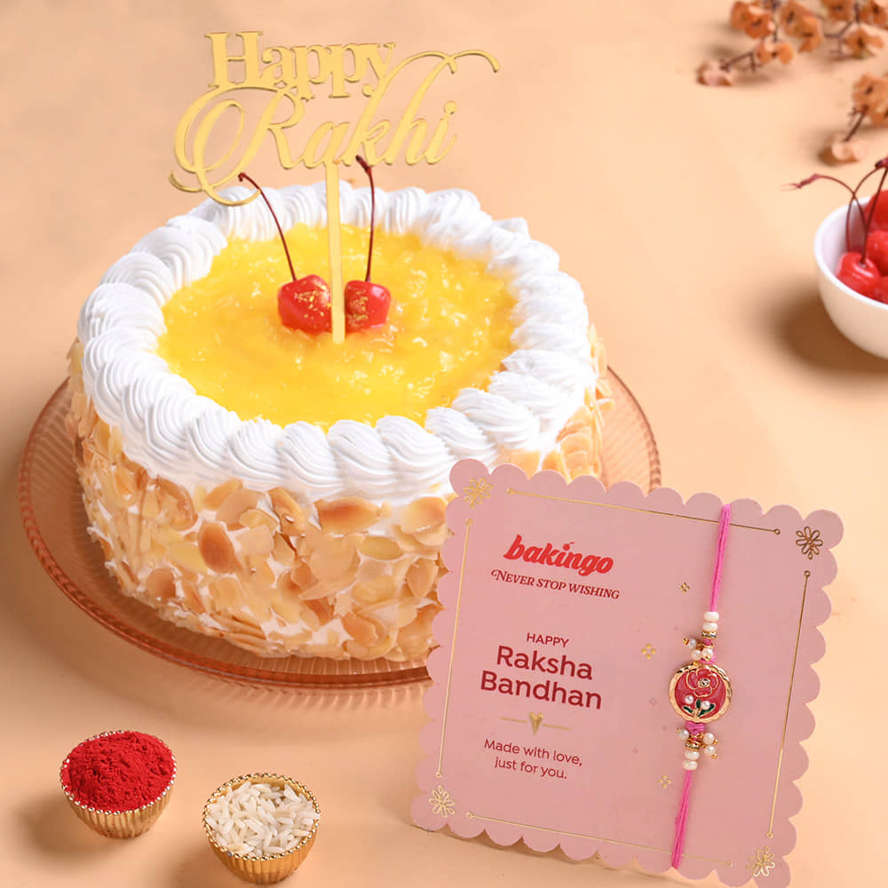 Pineapple Cake With Floral Pearl Rakhi Pineapple Cake N Floral Rakhi For Brother