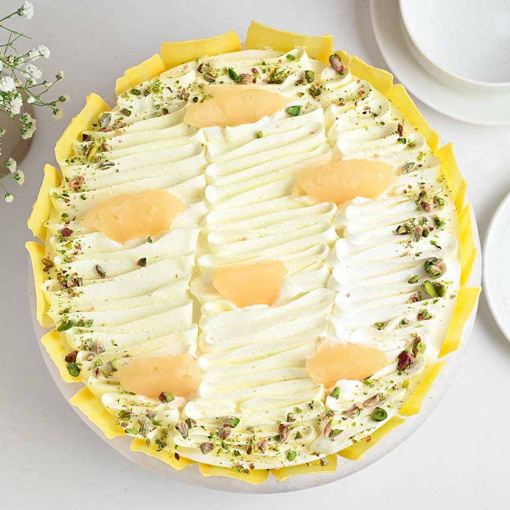 Front View of Pista Pineapple White Cream Cake