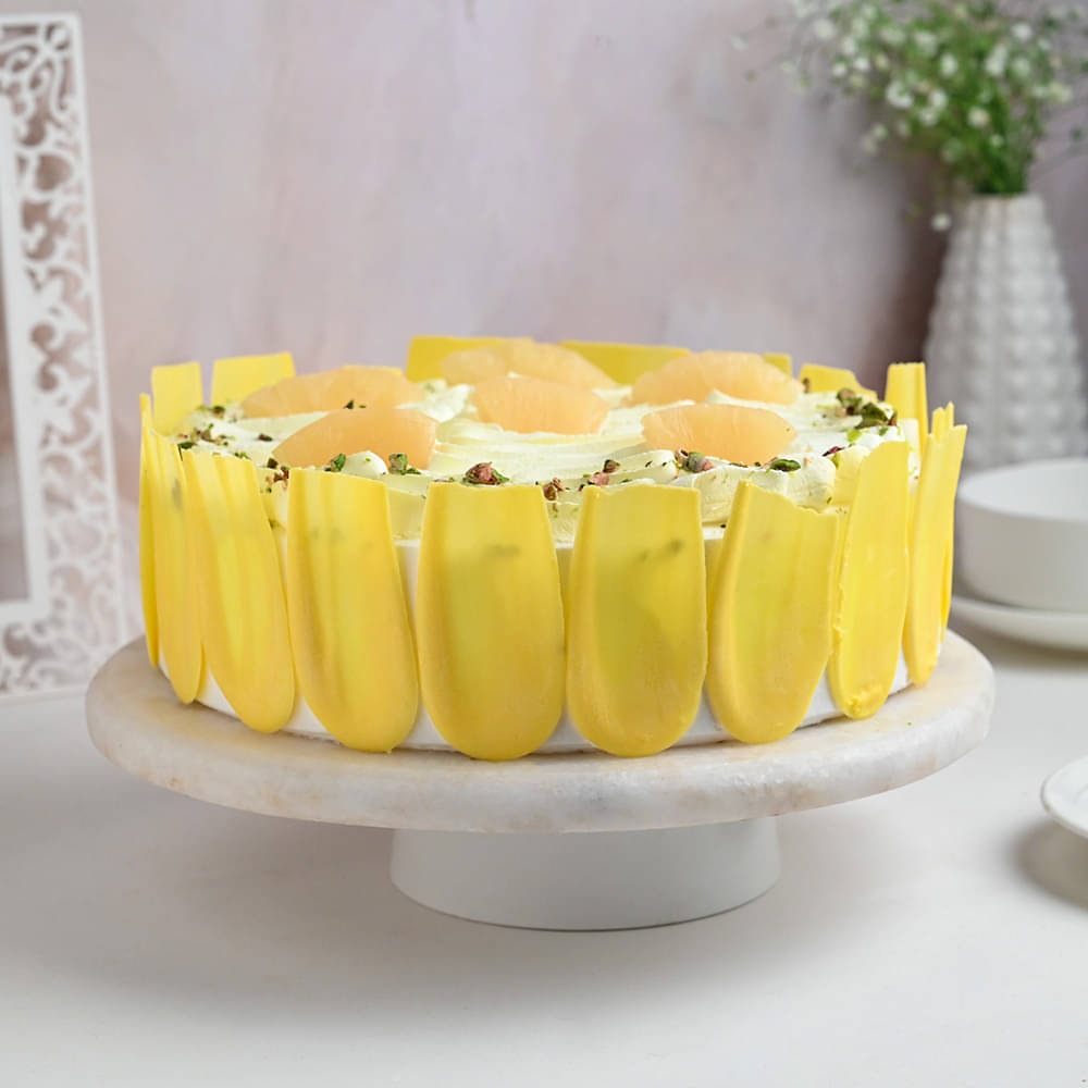 Side View of Pista Pineapple White Cream Cake