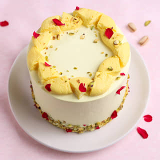 Top View of Rose Petals N Pistachio Rasmalai Cake Top View of Rose Petals N Pistachio Rasmalai Cake