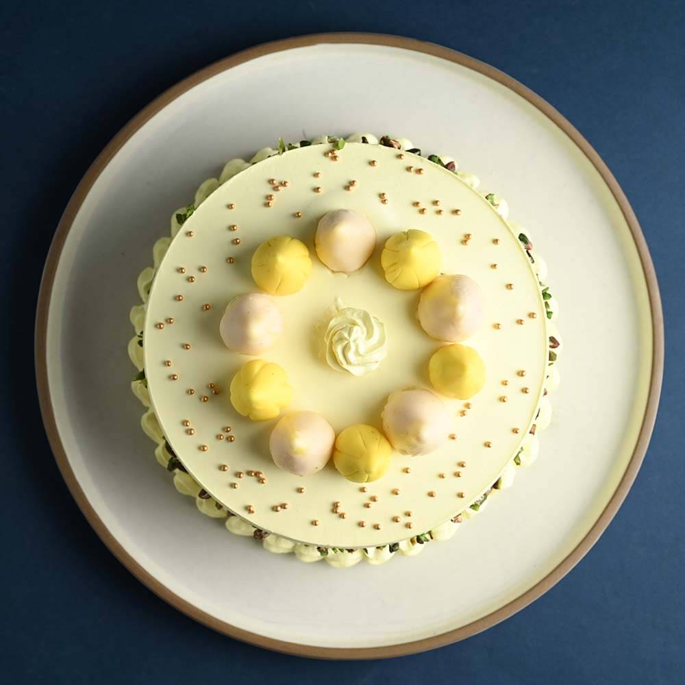 Pistachio Coated Butterscotch Modak Cake