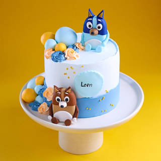 Front Angled View of Playful Bluey Celebration Cake