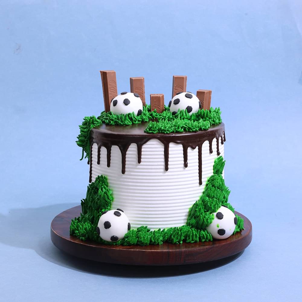 Zoomed View of  Playful Football Theme Fondant Cake