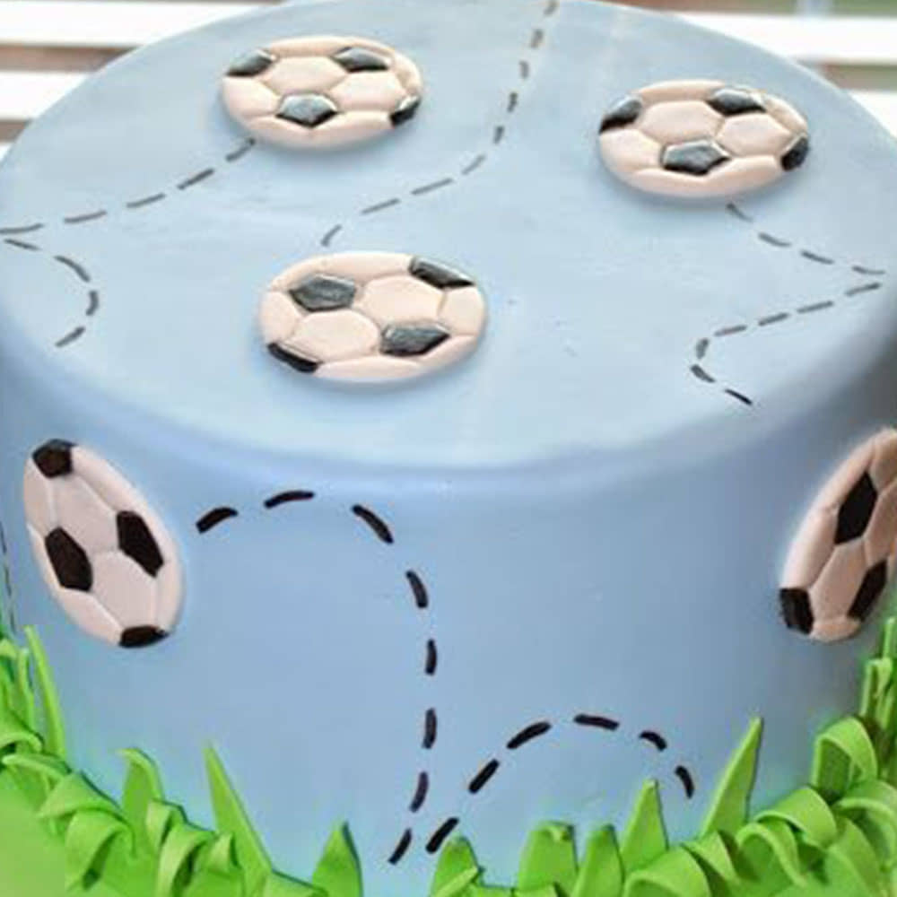 Zoomed View of  Playful Football Theme Fondant Cake