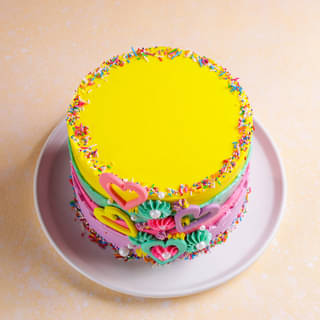 Top View of Rainbow Sprinkled Hearts Cake Top View of Rainbow Sprinkled Hearts Cake