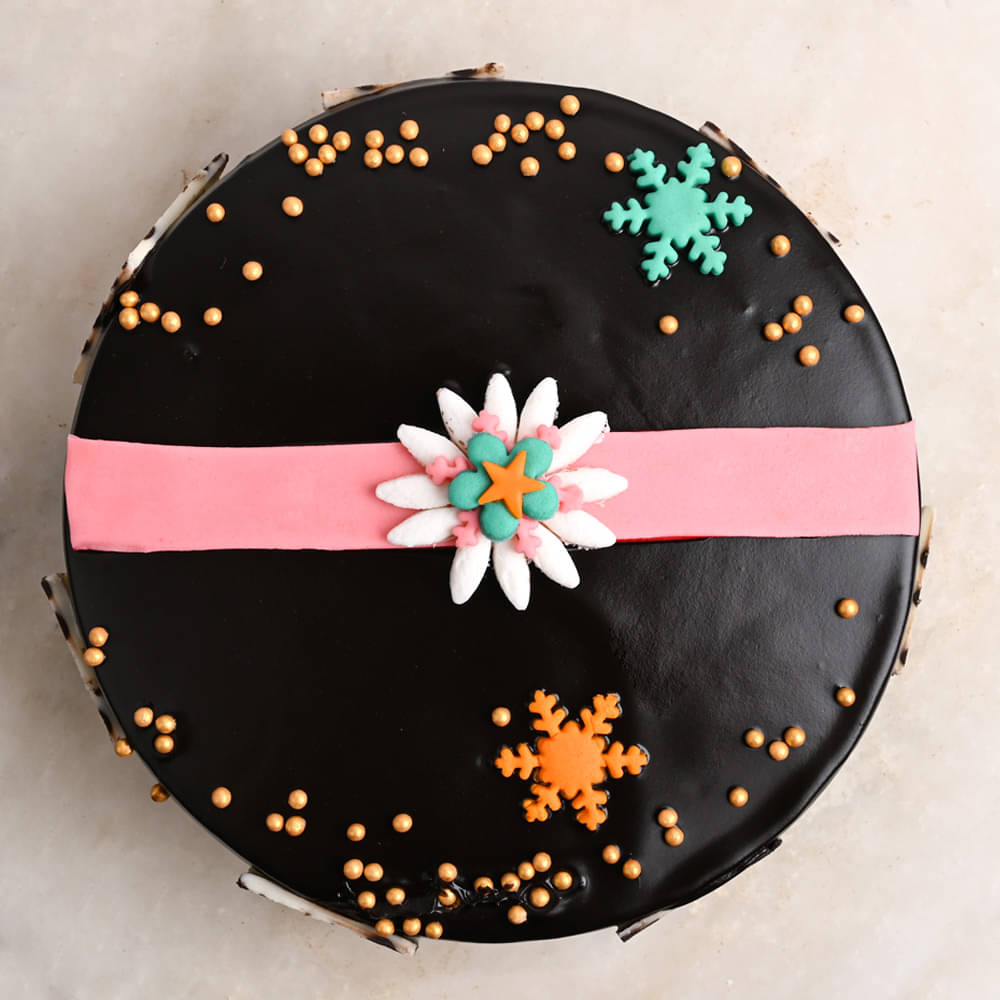 Chocolate Cake Topped With Rakhi Combo Top View of Raksha Bandhan Chocolate Cake With Rakhi