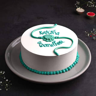 Raksha Bandhan Vanilla Cake N Bhaiya Bhabhi Rakhi Set