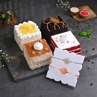 Set Of Four Pastries With Embellished Rakhis Set Of Four Pastries With Embellished Rakhi
