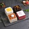 Order Set Of Four Pastries With Embellished Rakhi Online