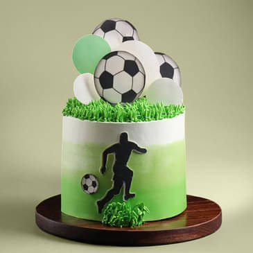 Side View of Soccer Theme Cream Cake