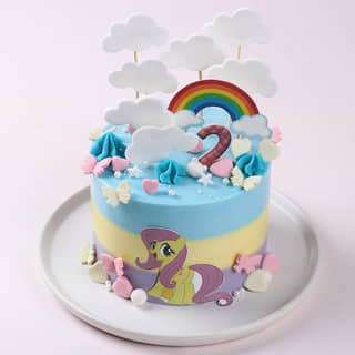 Front View of Sprinkled Clouds Pony Cake Front View of Sprinkled Clouds Pony Cake