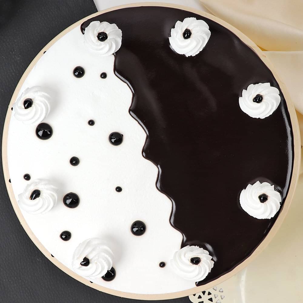 Lateral View of Black and white Blackforest Cake