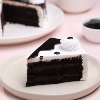 Sliced View of Choco Vanilla Whipped Cream Cake