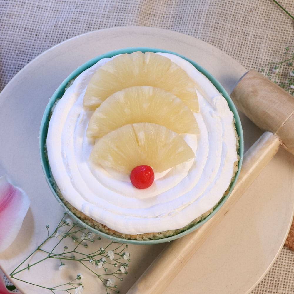 Top View of Opened Avenger Pineapple Pinata Cake