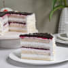 Sliced View of Blueberry Vanilla Cake with ingredients