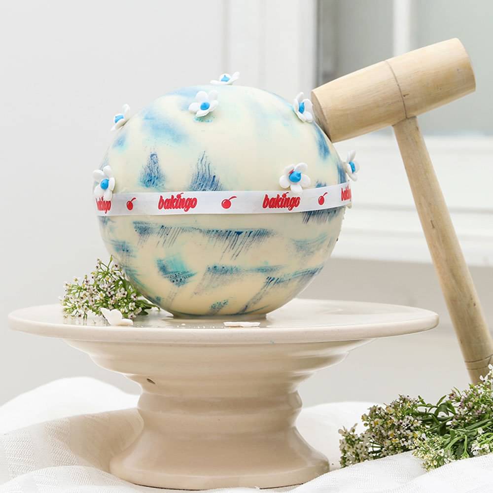 Snowy Chocolate Pinata Cake Online