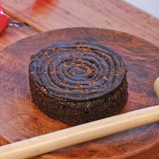 Side View of Smashed Spiderman Pinata Cake with Hammer