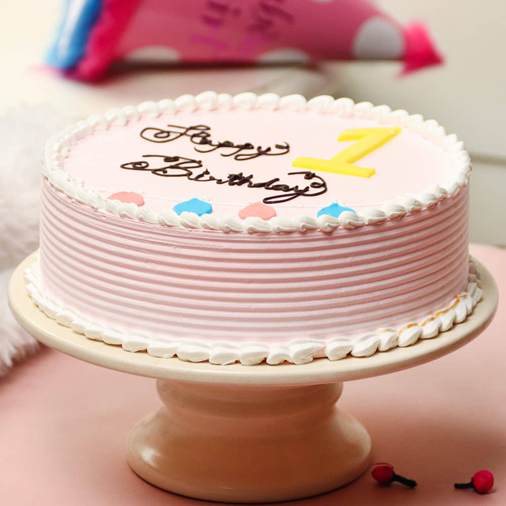 Side view of Happy First Birthday Cake