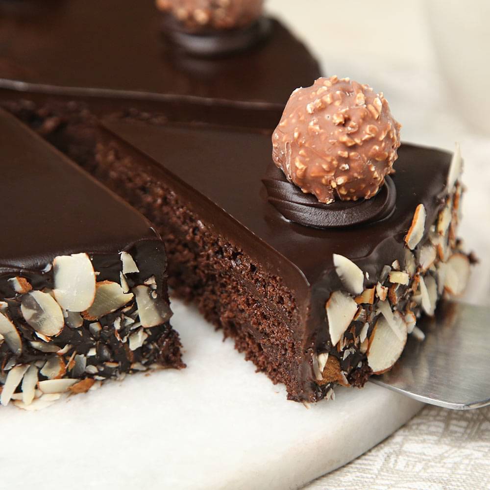Sliced View of Chocolate Ferrero Rocher Almonds Cake