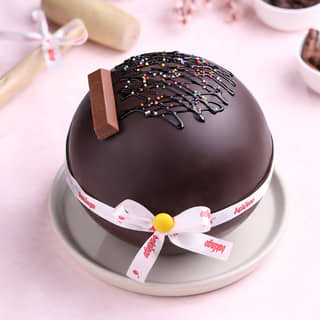 Ferrero Rocher and Kitkat Pinata Ball Cake