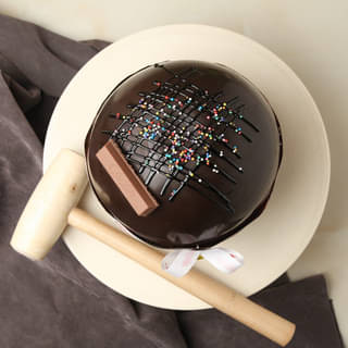 Smashing Ferrero Rocher and Kitkat Pinata Ball Cake