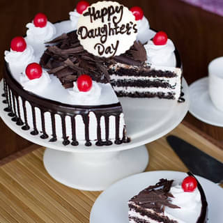 Sliced view of Happy Daughters Day Black Forest Cake