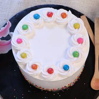 Top View of Rainbow Gems Pinata Cake