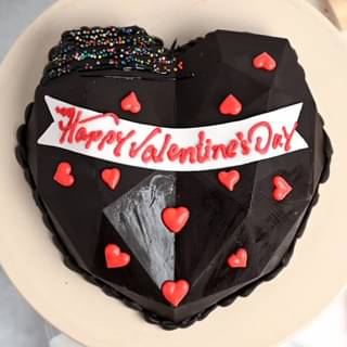 Top View of Heart Shaped Chocolate Pinata Cake For Valentines Day