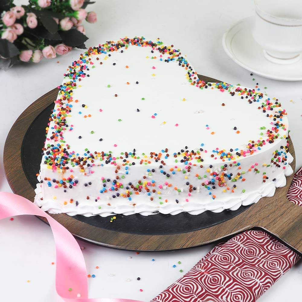 Side View of Heart Shaped Pineapple Sprinkled Cake