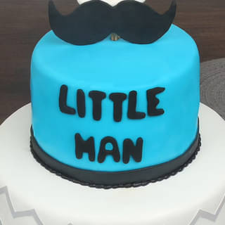 Side View of Kidzy Affair Fondant Cake for 1 Year Old Boy