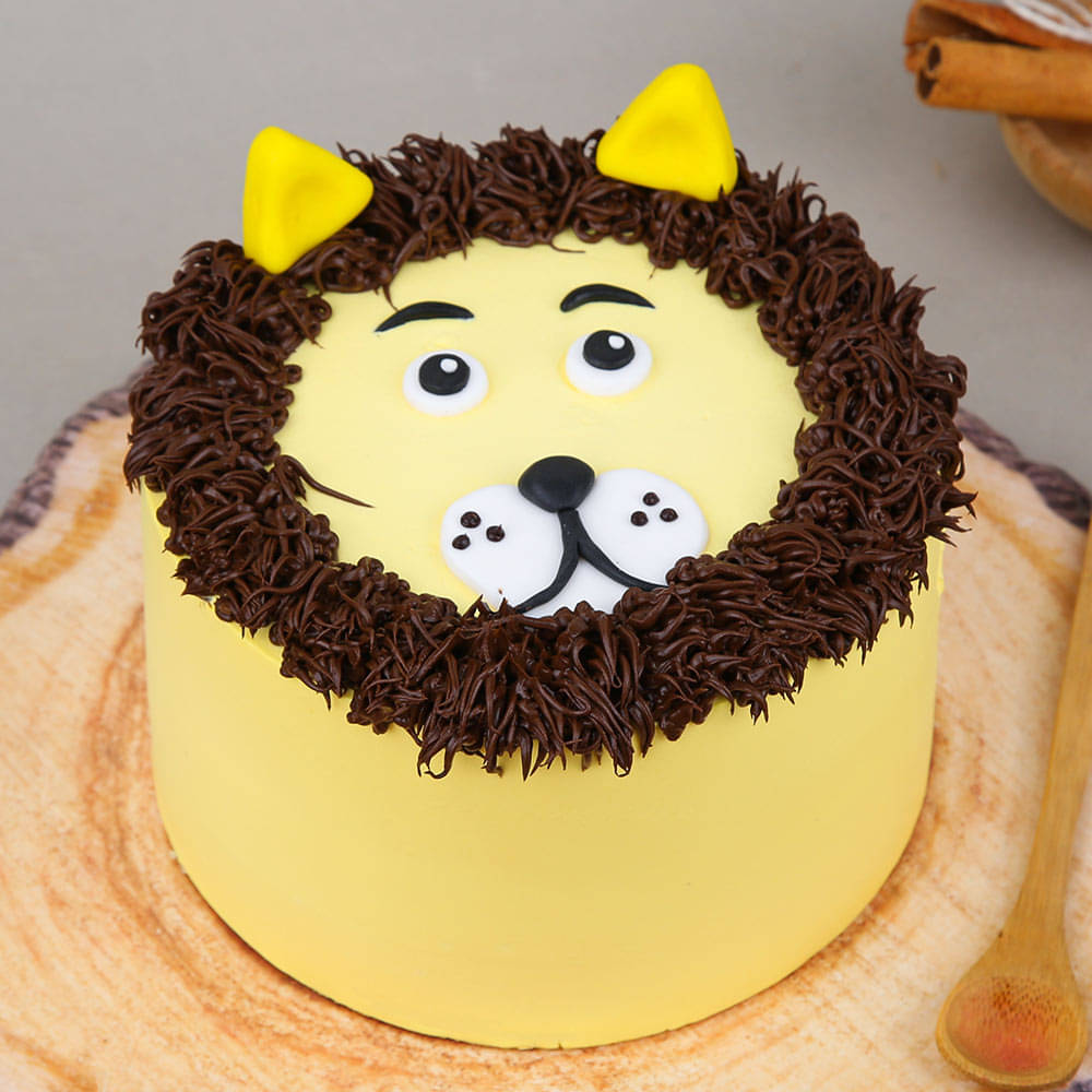 My first 'big' cake - a lion for my son's second birthday! I have a lot to  learn but I'm pretty pleased with how it turned out! : r/Baking