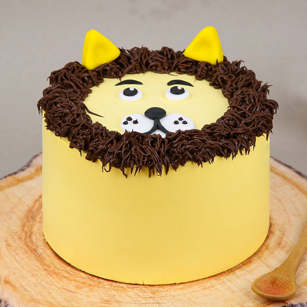 Sheet Cake with Piped Lion Face — Trefzger's Bakery