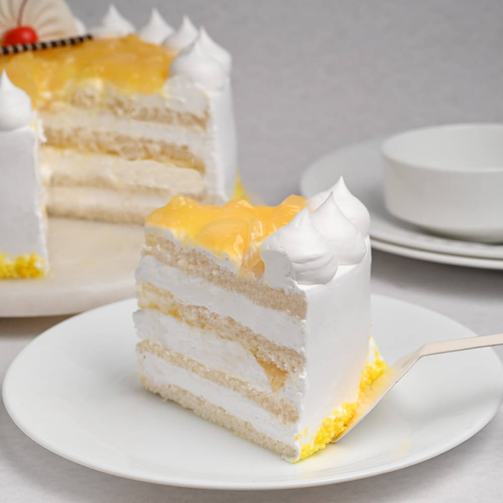 Sliced View of Whipped Cream Pineapple Cake Online